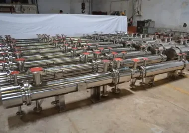 Spiral heat exchanger used in chemical processing application